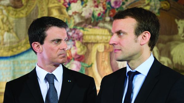 French Prime Minister Manuel Valls and French Economy and Industry minister Emmanuel Macron after meeting with CEO of French retail and supermarket group Systeme U ( and other representatives of supermarkets at the Hotel Matignon. Paris, FRANCE - 08/02/2016./CHAMUSSY_lcham025/Credit:CHAMUSSY/SIPA/1602081551