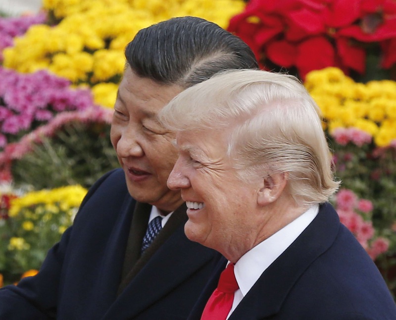 9 novembre 2017, Donald Trump et Xi Jinping conversent dans le Grand Hall du Palais du Peuple à Pékin.